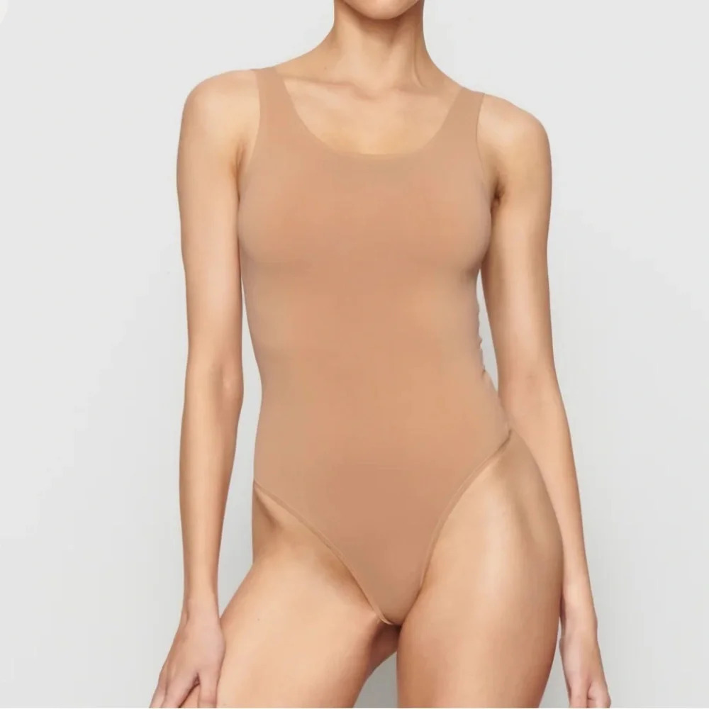 SKIMS Soft Smoothing Seamless Thong Bodysuit XXS